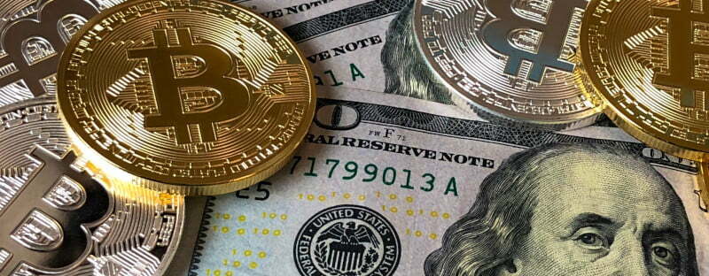 Bitcoin dollar bills coins